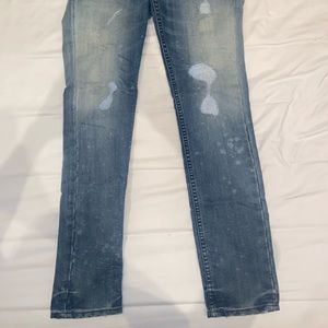 People’s Liberation Mid Wash Skinny Jeans